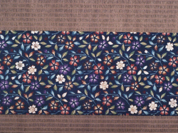 紅型 丹後ちりめん花小紋 名古屋帯の前の柄