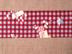 木綿 格子縞に歌舞伎柄 名古屋帯の前の柄