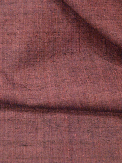 紬 真綿手紡ぎ糸 無地濃淡焦げ赤茶袷の生地アップ
