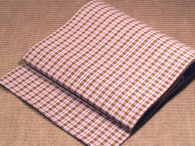 ミャンマー民族布祭礼用ロンジー 格子縞に絣文様（桜） 名古屋帯のイメージショット